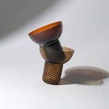 Decorative Plash Glasses stacked on top of each other on a white background.