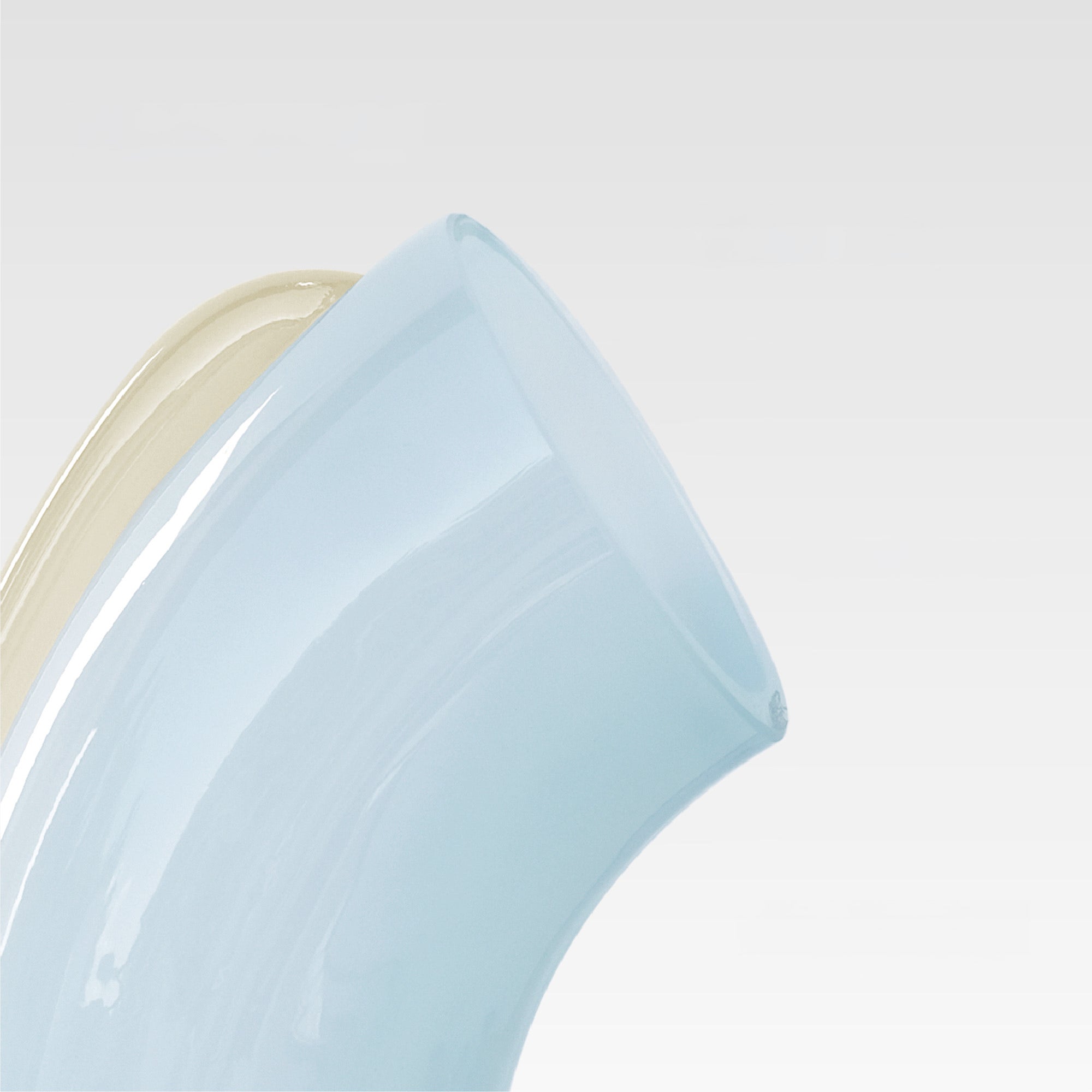 Close up of the soft blue Nessie with a white background.