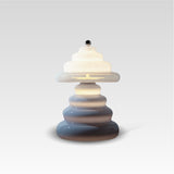 Pulsar Lamp, opaline and blue. Wavy form with soft natural light. Deep dark blue at the base transitions into a soft light colour. Clean background.