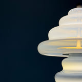 Close-up of a pulsar lamp with a dark blue background.
