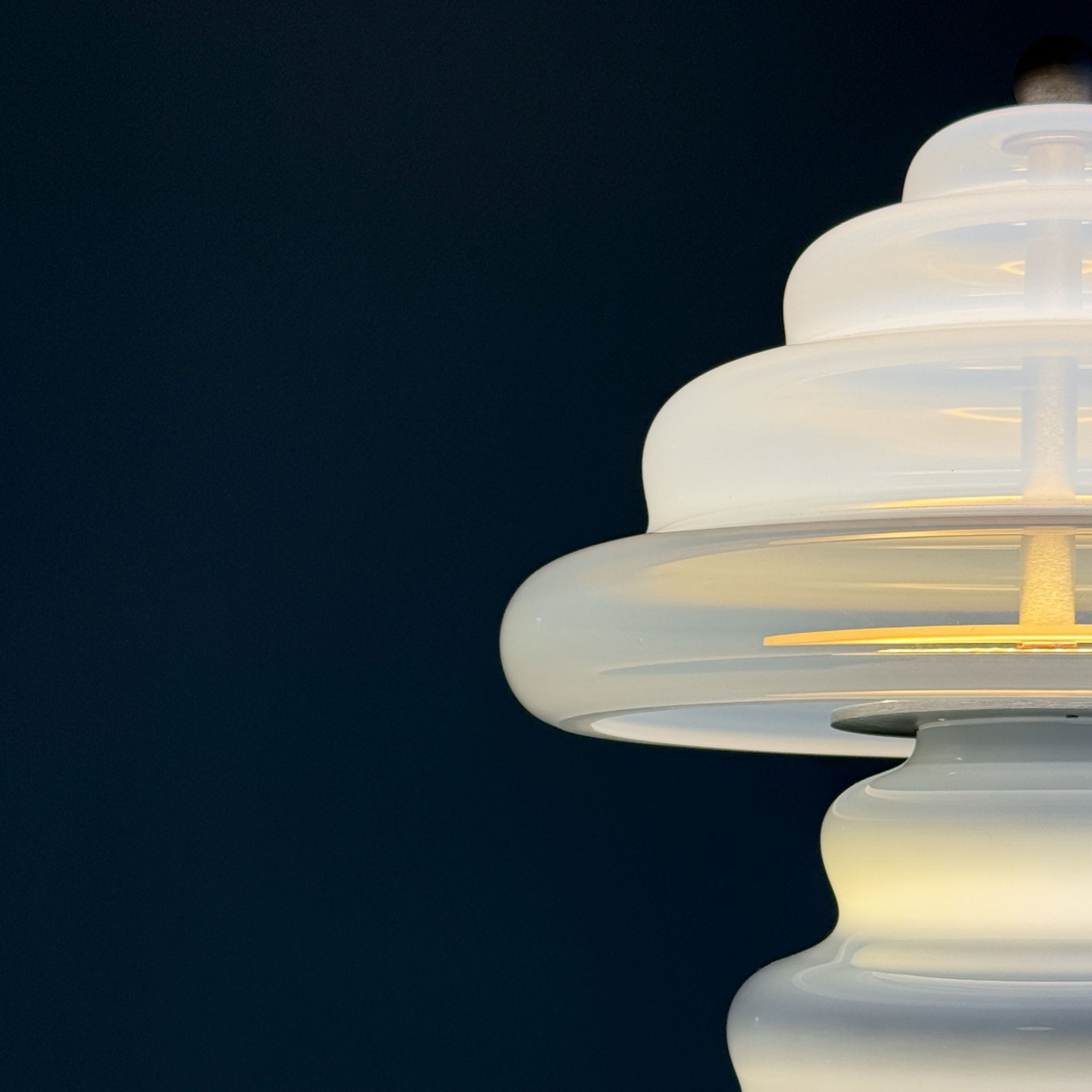 Close-up of a pulsar lamp with a dark blue background.